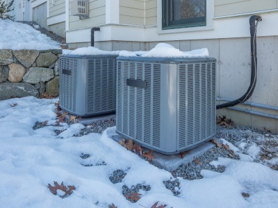 HVAC units with snow on them.